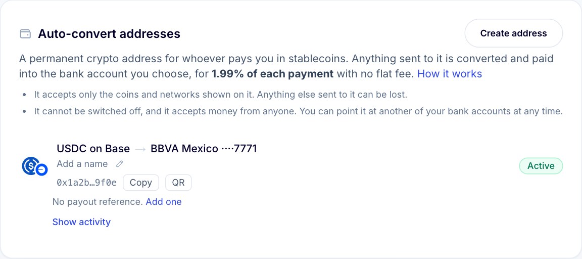 The Auto-convert addresses panel in Rampy, showing one address for USDC on Base that pays into a bank account, with Copy and QR buttons.